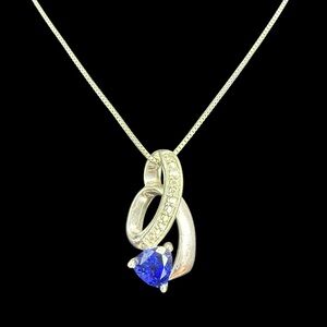Elegant Silver and Blue Pendant Necklace